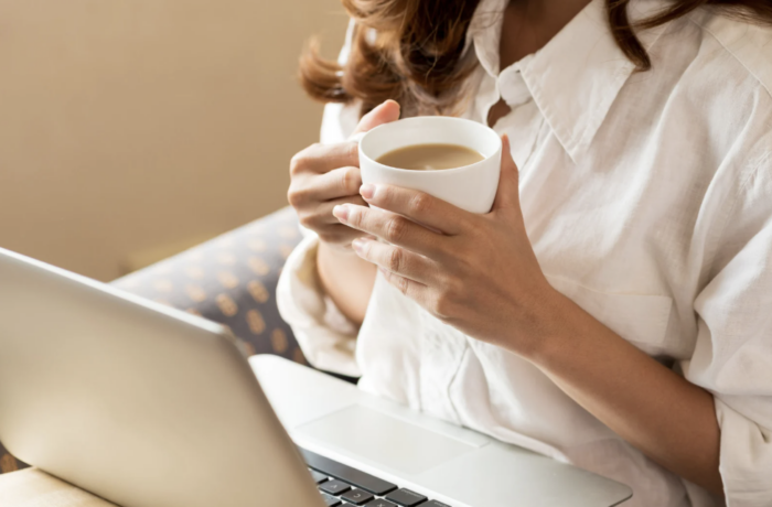 Woman drinking coffee ready to go back to work
